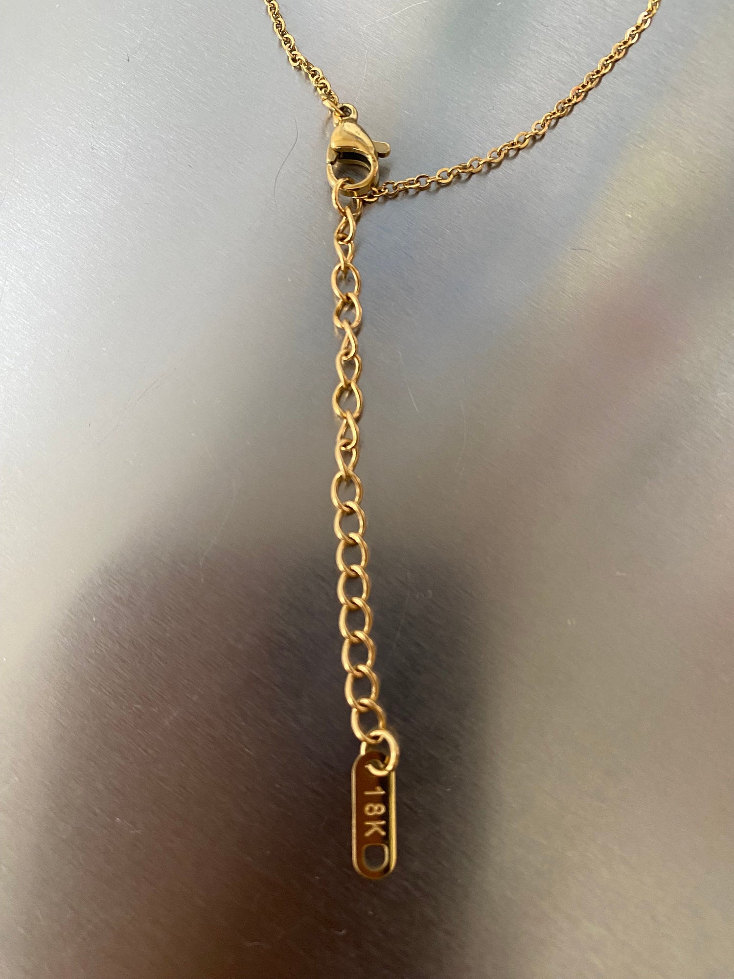 Zircon star necklace with adjustable chain for layered look