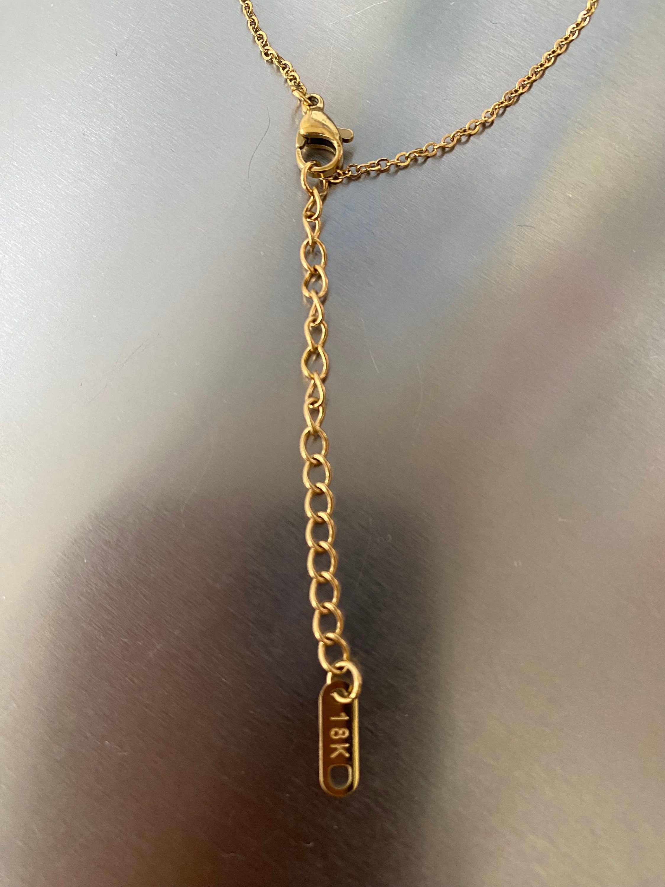 Zircon star necklace with adjustable chain for layered look